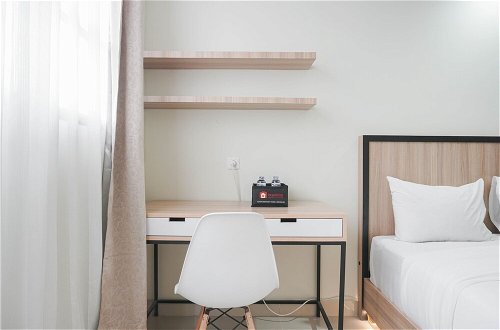 Photo 15 - Nice And Cozy Studio At Evenciio Margonda Apartment