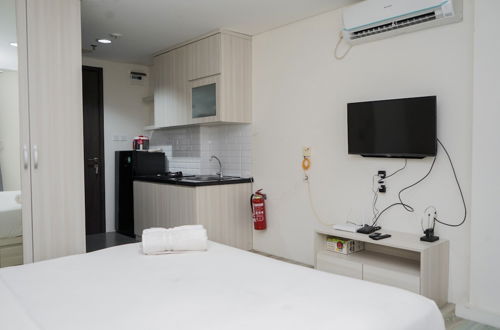 Photo 10 - Warm And Cozy Studio Bintaro Icon Apartment