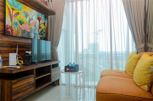 Foto 14 - Cozy and Simple Living 1BR Grand Kamala Lagoon Apartment