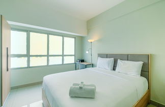 Photo 1 - Functional and Minimalist Studio Apartment at Springlake Summarecon