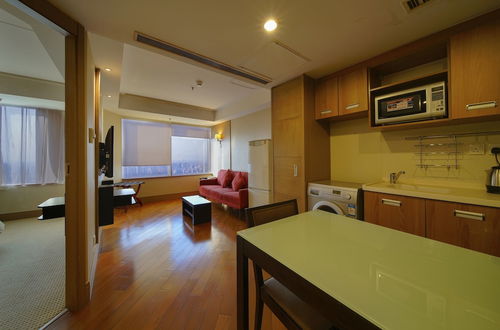 Foto 5 - Jingguang Center Apartment