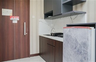 Photo 3 - Cozy Design 1Br Apartment At Scientia Residence
