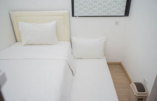 Photo 2 - Comfrot 2Br At Sky House Bsd Apartment