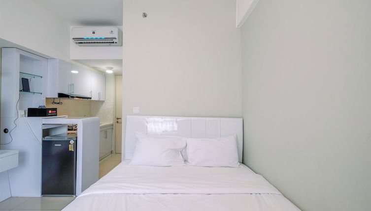 Photo 1 - Nice And Comfy Studio At Springlake Summarecon Apartment