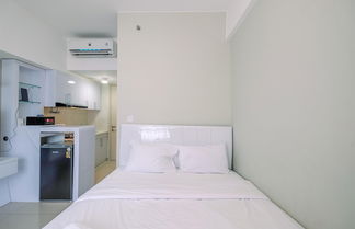 Photo 1 - Nice And Comfy Studio At Springlake Summarecon Apartment