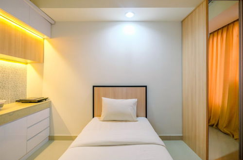 Photo 3 - Best Deal Studio at Evenciio Apartment near Campus Area