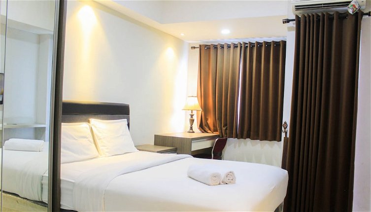Photo 1 - Fully Furnished with Spacious Design Studio Apartment at The Oasis Cikarang