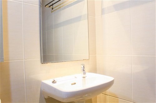 Photo 12 - Fully Furnished with Spacious Design Studio Apartment at The Oasis Cikarang