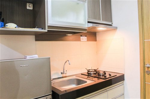 Photo 11 - Fully Furnished with Spacious Design Studio Apartment at The Oasis Cikarang