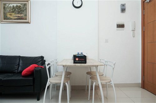 Photo 12 - Minimalist And Cozy 2Br Apartment At The Nest Near Puri By Travelio