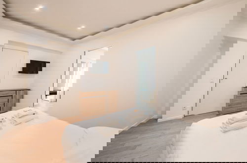 Foto 2 - Spacious Apartment With 2 Rooms