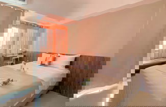 Foto 2 - Cozy and Warm Studio at LRT City Jatibening Apartment