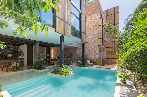 Photo 12 - Exquisite Bohemian 3BR Apartment Aldea Zama Insta-worthy Pool Bikes Amazing Amenities