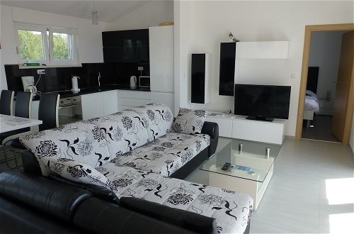 Photo 1 - Nice Apartment With Shared Swimming Pool Near the Beach and Trogir