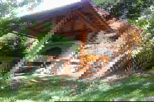 Foto 12 - Traditional Wooden House by the River