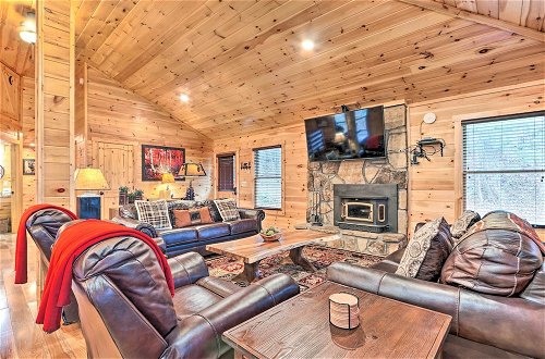 Photo 1 - Luxe Cabin w/ Hot Tub, Theater, Pool Table, Arcade