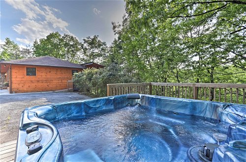 Photo 45 - Luxe Cabin w/ Hot Tub, Theater, Pool Table, Arcade