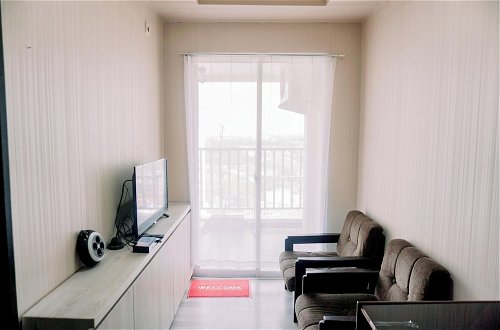 Photo 10 - Great Deal And Homey 1Br Apartment Belmont Residence Puri