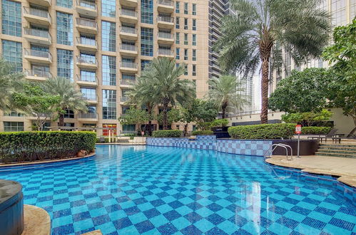 Foto 9 - Manzil -Cozy 1BR Apt w/ Downtown Skyline Burj View