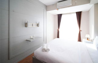 Photo 1 - Modern And Cozy 1Br At Grand Sungkono Lagoon Apartment