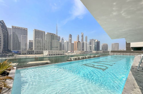 Foto 22 - WelHome - Contemporary 1BR in Binghatti Canal & Burj Views