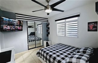 Photo 2 - Cozy and Modern Apartment Black & White With Jacuzzi on Terrace