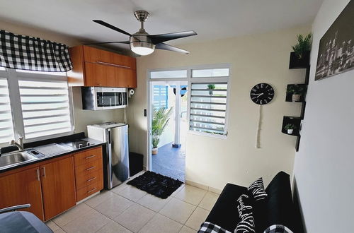 Photo 1 - Cozy and Modern Apartment Black & White With Jacuzzi on Terrace