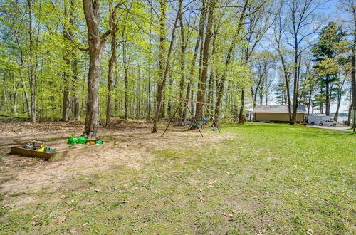 Photo 9 - Rustic Cabin w/ Fire Pit, Steps to Sand Lake