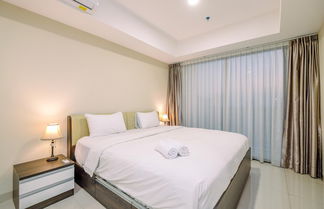 Photo 2 - Homey And Minimalist 2Br Apartment At Nine Residence