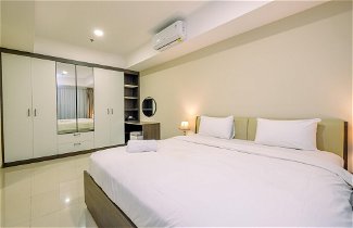 Photo 1 - Homey And Minimalist 2Br Apartment At Nine Residence