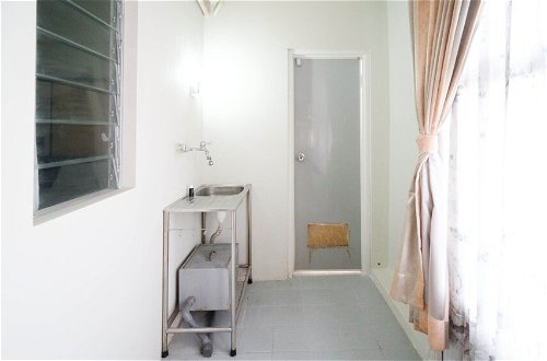 Photo 15 - Simple And Homey 2Br At Dian Regency Apartment