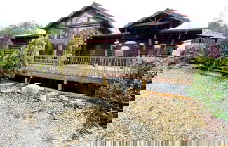 Photo 1 - A true log cabin with 360 degree mountain views - Pet and Motorcycle friendly! 5 Bedroom Cabin by RedAwning