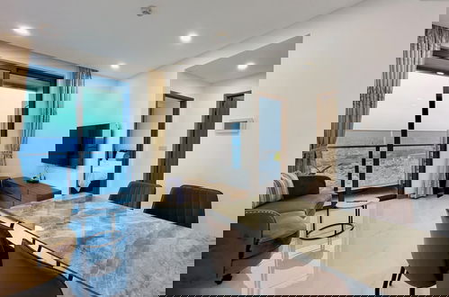 Foto 5 - DongDong Apartment in Sunwah Pearl