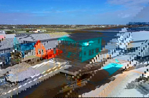 Photo 3 - Waterfront w/ Bay Views, Shared Pool & Boat Dock Marlin Madness by Avantstay