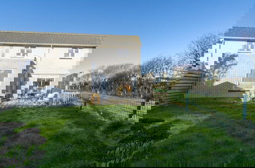 Foto 18 - Cozy Holiday Home With Terrace