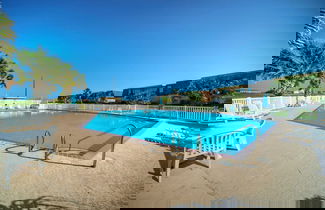 Photo 2 - Steps to Sandfest Beach Boardwalk, Pool, Tennis Beach Bungalow by Avantstay