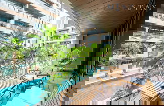 Foto 2 - Trendy City Walk Living w Pool View Balcony
