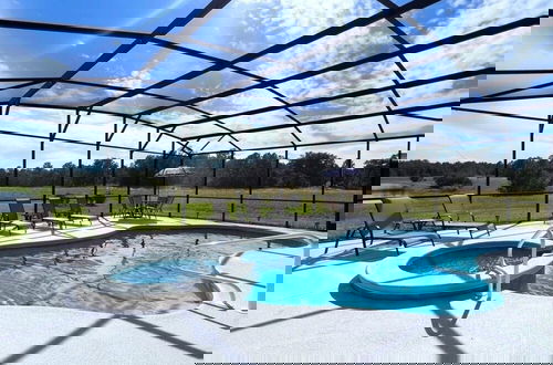 Foto 24 - Cozy Family Friendly Pool Home With Game Room 5 Bedroom Home by RedAwning