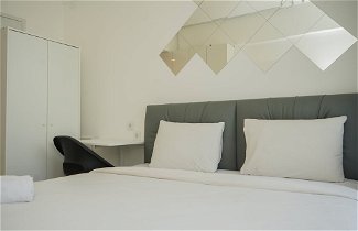 Photo 2 - Nice And Homey Studio Room At Sky House Bsd Apartment