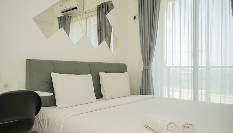 Foto 1 - Nice And Homey Studio Room At Sky House Bsd Apartment