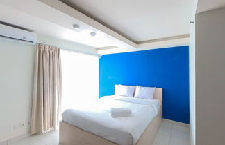 Foto 1 - Comfort And Warm Studio Room At Amethyst Kemayoran Apartment