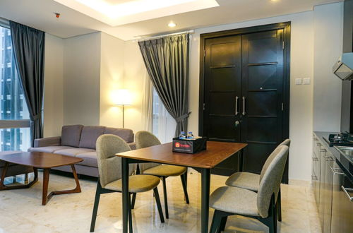 Photo 11 - Modern Furnished 2BR at The Empyreal Condominium Epicentrum Apartment