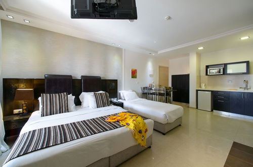 Foto 6 - Royalty Suites