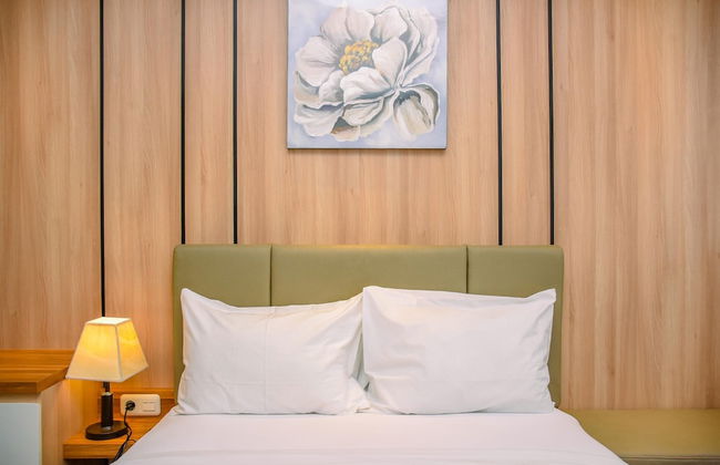 Nice And Cozy Studio At Evenciio Apartment - Photo 1