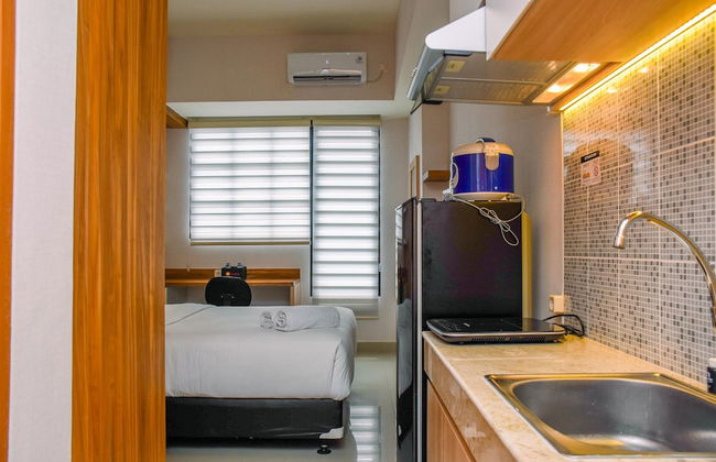 Nice And Cozy Studio At Evenciio Apartment - Photo 15