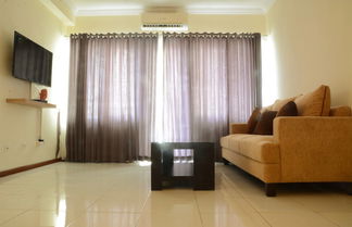 Foto 1 - Luxury Design Grand Palace Kemayoran Apartment With Private Bathtub