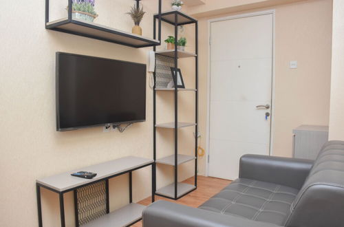 Photo 8 - Enjoy Living And Tidy 1Br Bassura City Apartment