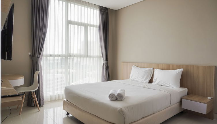 Photo 1 - Minimalist and Comfort Living 1BR at Ciputra International Apartment