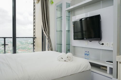 Photo 12 - Homey And Warm Studio At Sky House Bsd Apartment