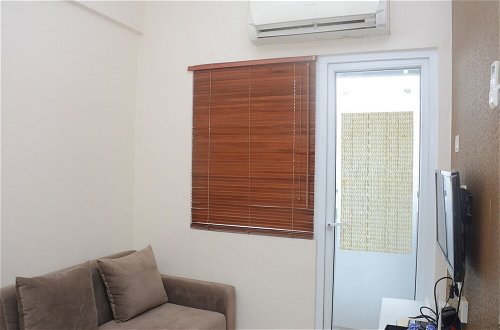 Foto 5 - Comfortable 2BR at Green Pramuka City Apartment Direct Access to Mall